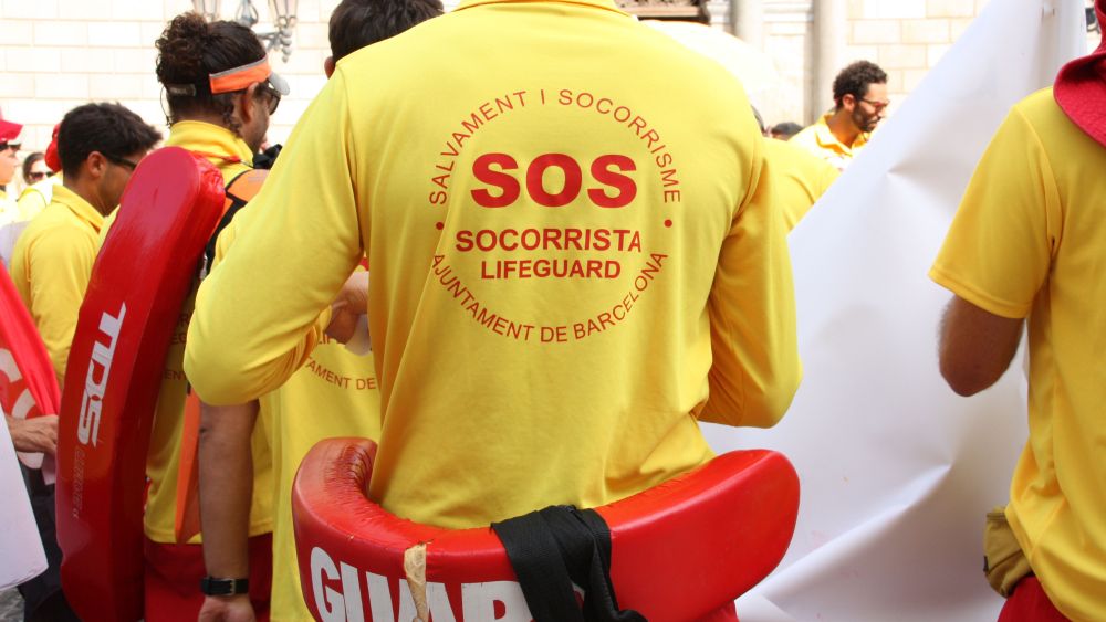 Samarreta d'un socorrista a la concentració del dia 1 d'agost Samarreta d'un socorrista a la concentració del dia 1 d'agost