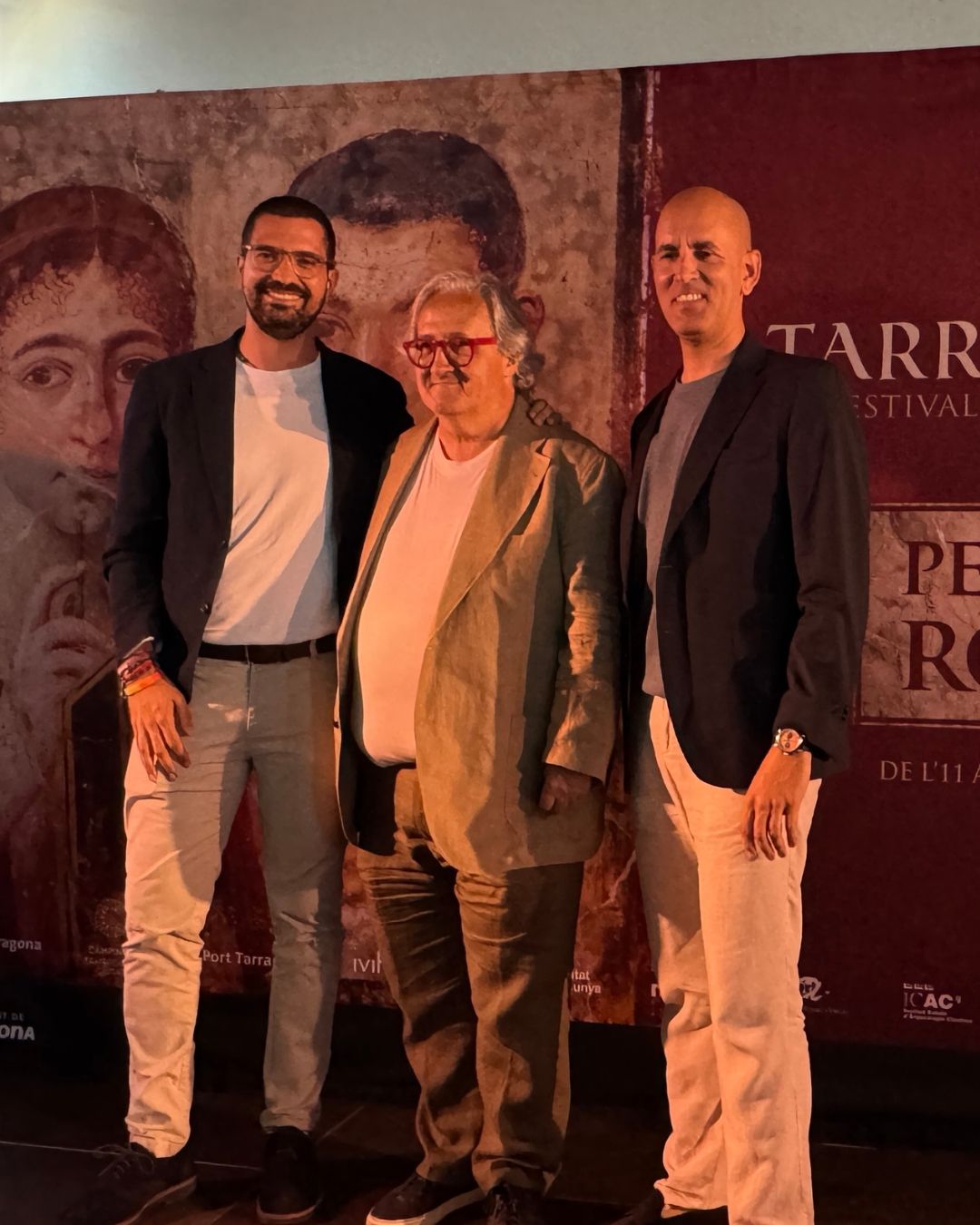 El conseller Nacho Garcia, l'actual director del Tarraco Viva, Magí Seritjol, i el seu successor, Julio Villar