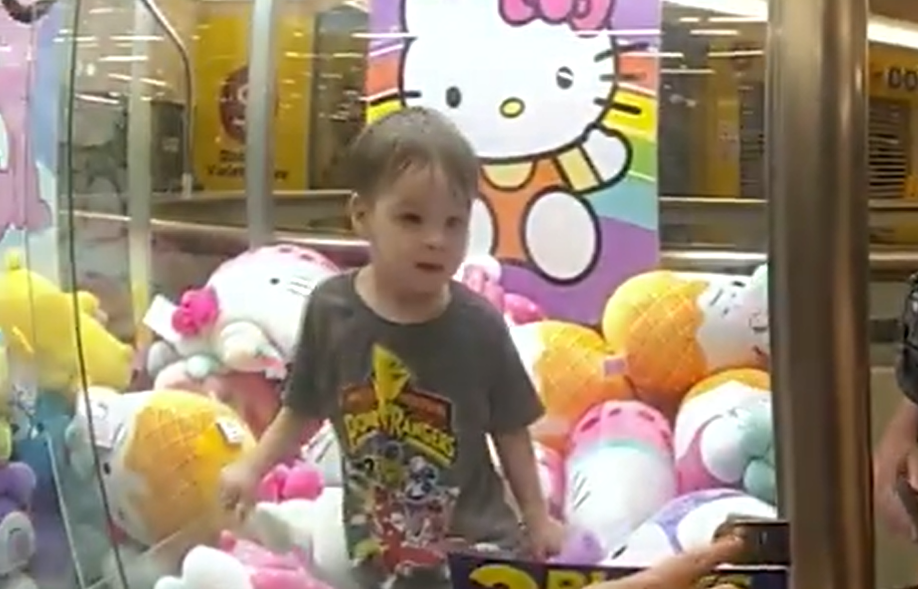 Boy stuck in stuffed animal machine